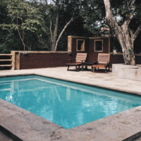 Backyard swimming pool, symbolizing concept of premises liability law.